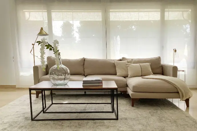a living room with a couch and a coffee table